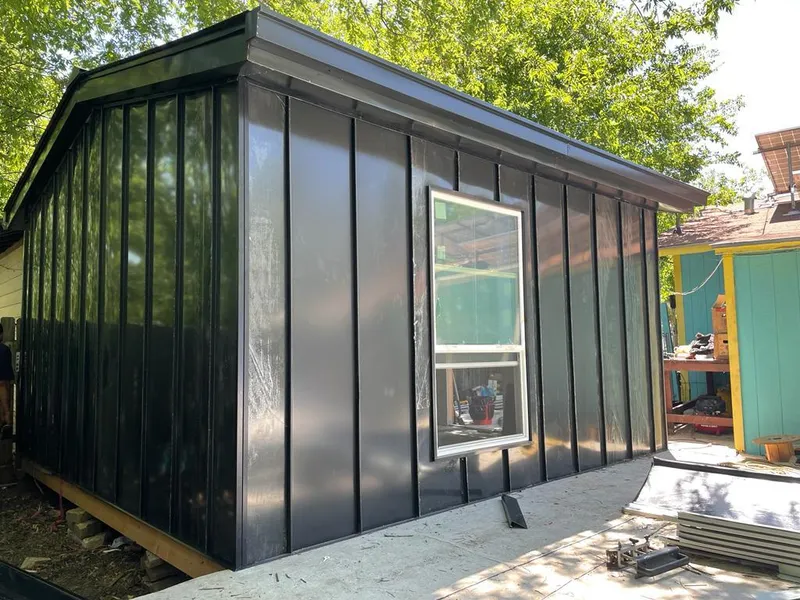 Black standing seam metal wall panels for Metal Roof Installation in Auburndale