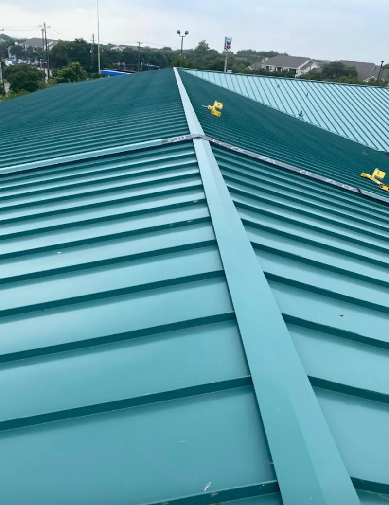 Green commercial metal roof ridge and valley for Metal Roof Repair in Auburndale